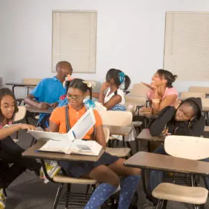 Students distracted and bored in a classroom setting.